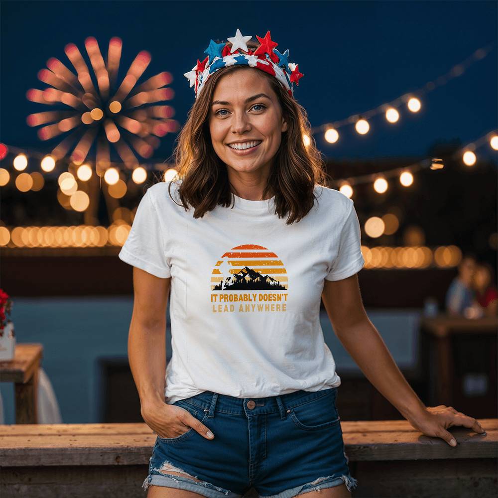 Adventure t-shirt featuring sunset, mountains, towering pines, and hiker trekking in nature