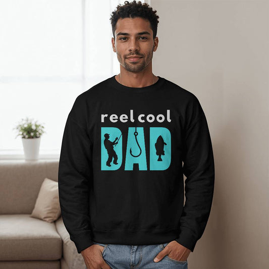 Cozy 'Reelcool Dad' sweatshirt featuring fishing-themed design, perfect for Father's Day gift.